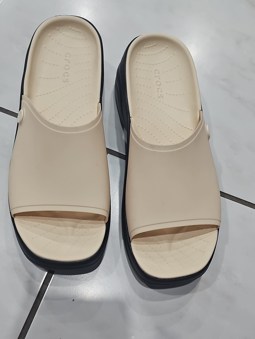 CROCS Two-Tone Slide Sandals in Cream and Black